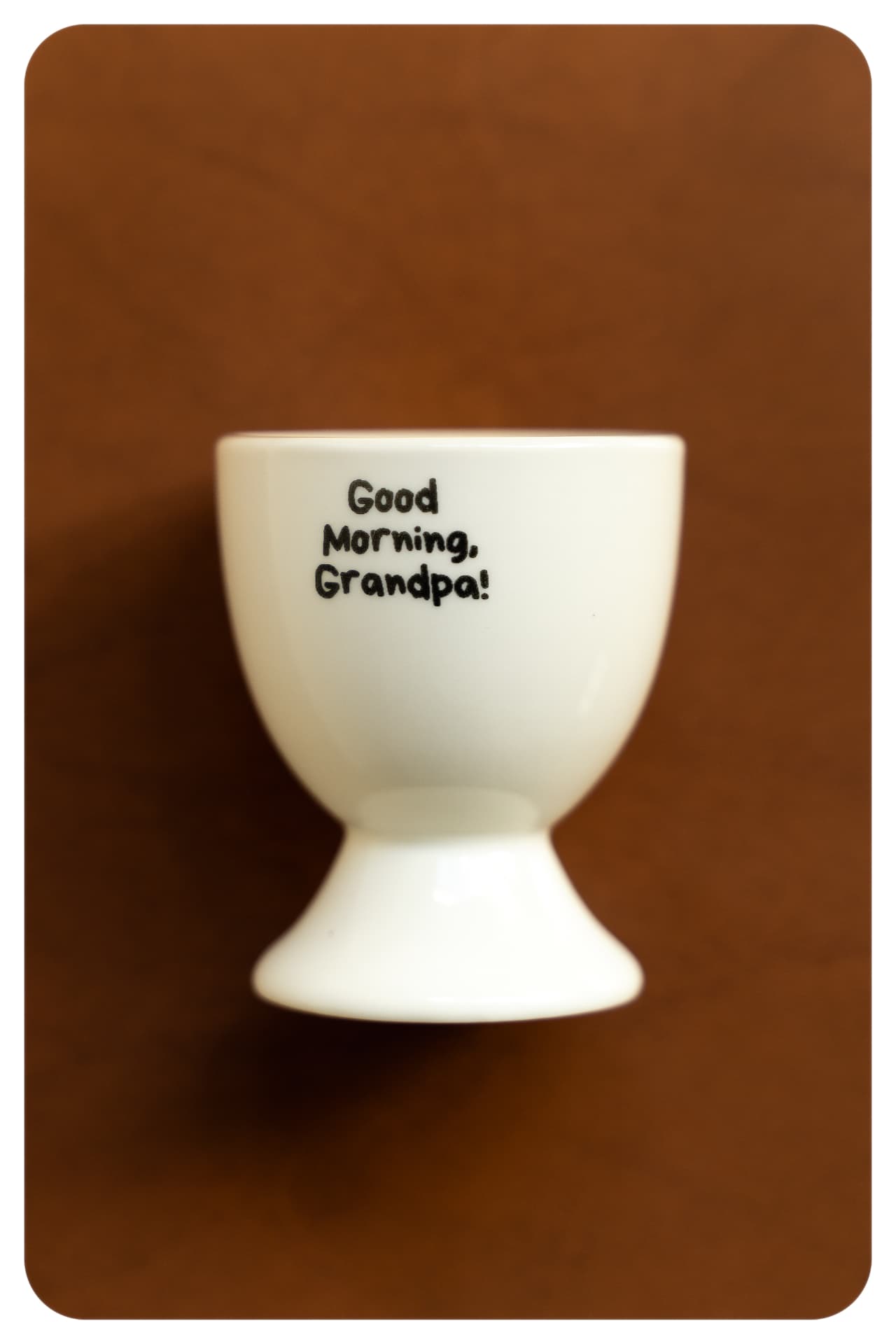 Ceramic egg cup printed with 'Good Morning, Grandpa!'