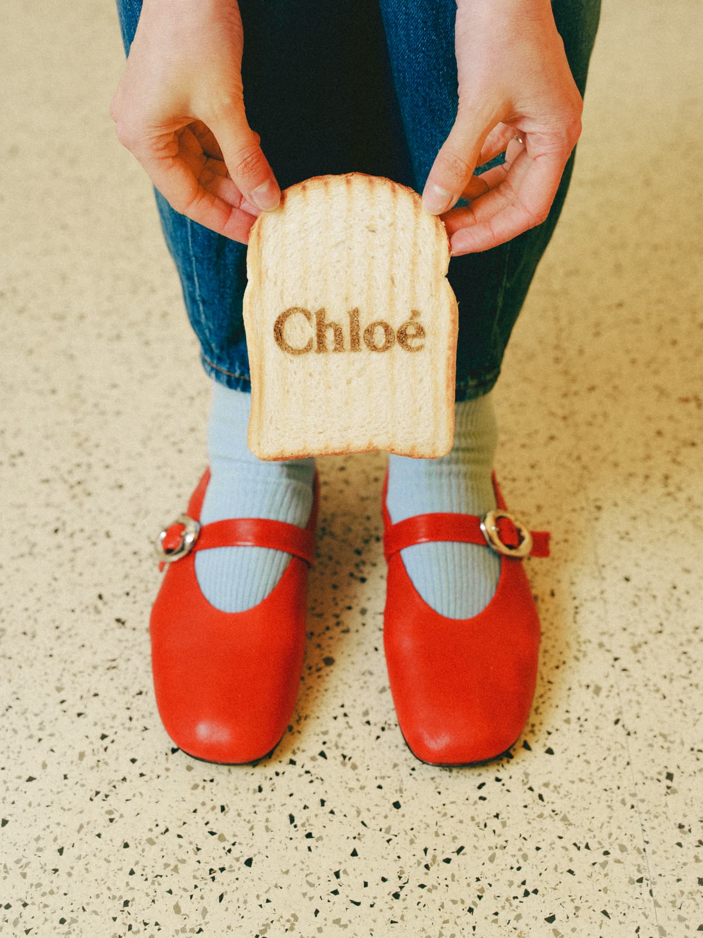 Food-safe laser engraving of the name Chloé on a slice of toast